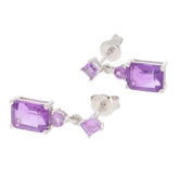Purple amethyst sterling silver earrings with sparkling gemstones, showcasing elegance and luxury in timeless design.